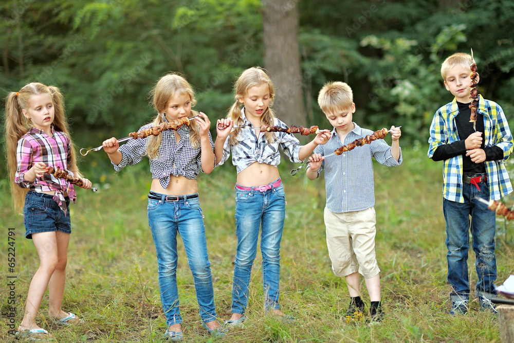 Portrait of children on vacation with a kebab