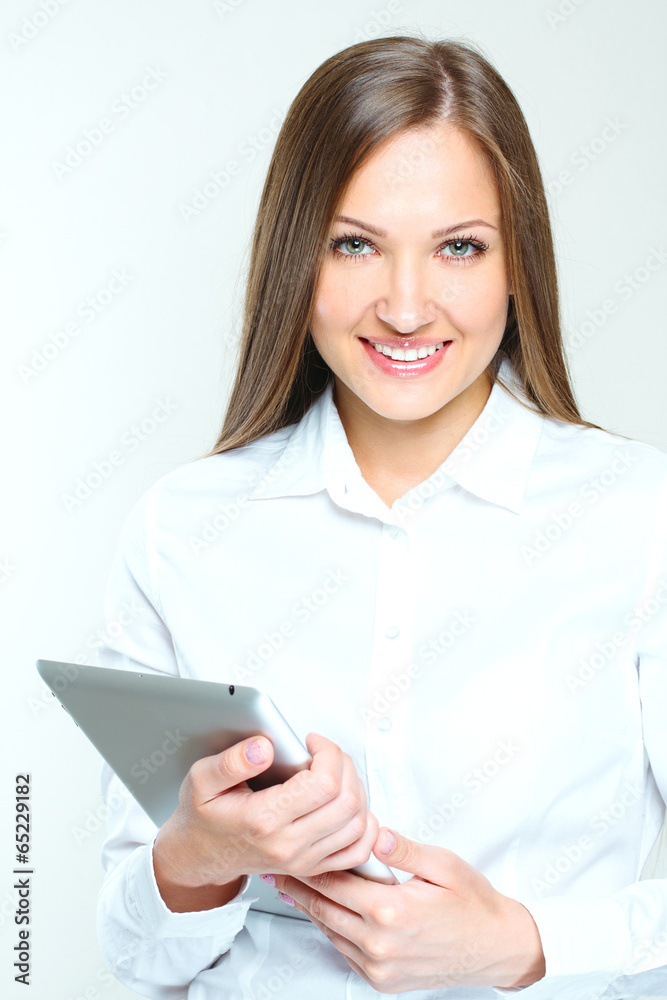 smiling business woman using tablet pc. smiling business woman using tablet pc.