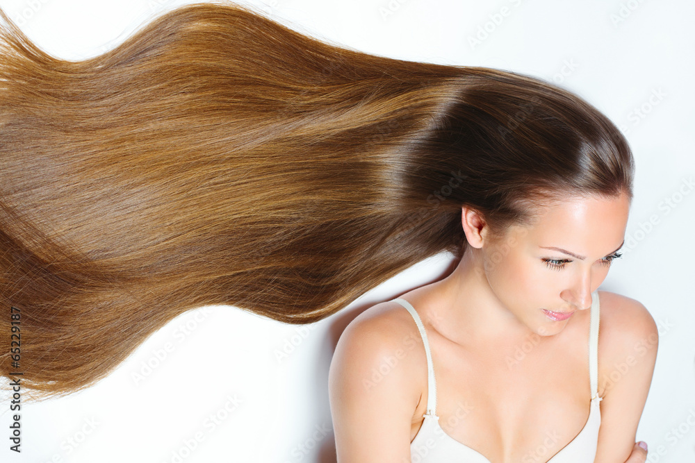 Fototapeta premium Beautiful Woman with Healthy Long Hair