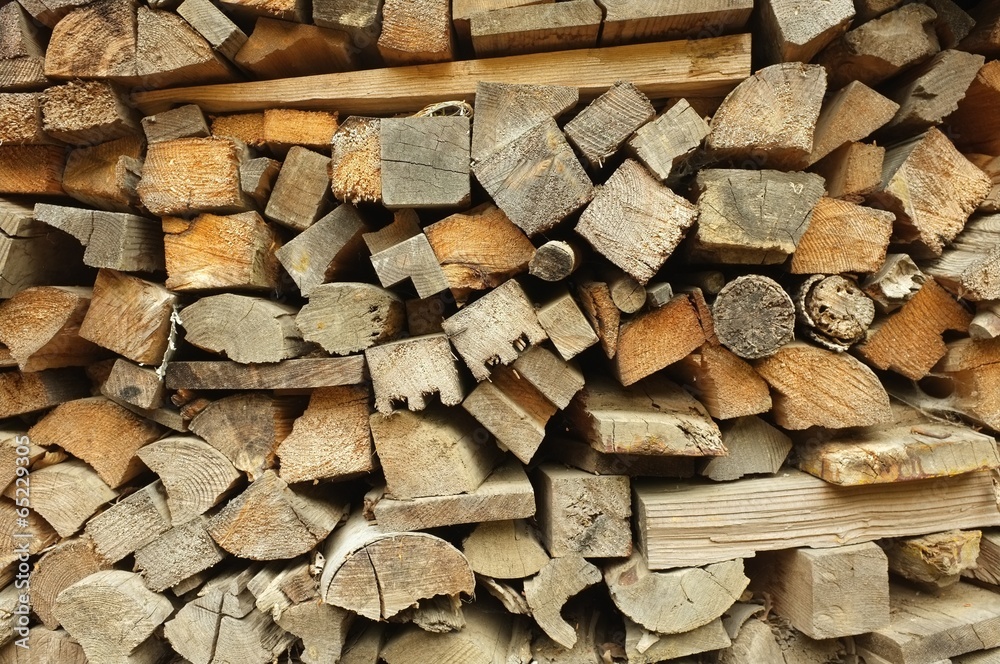 section of a pile of cut firewood section of a pile of cut firewood