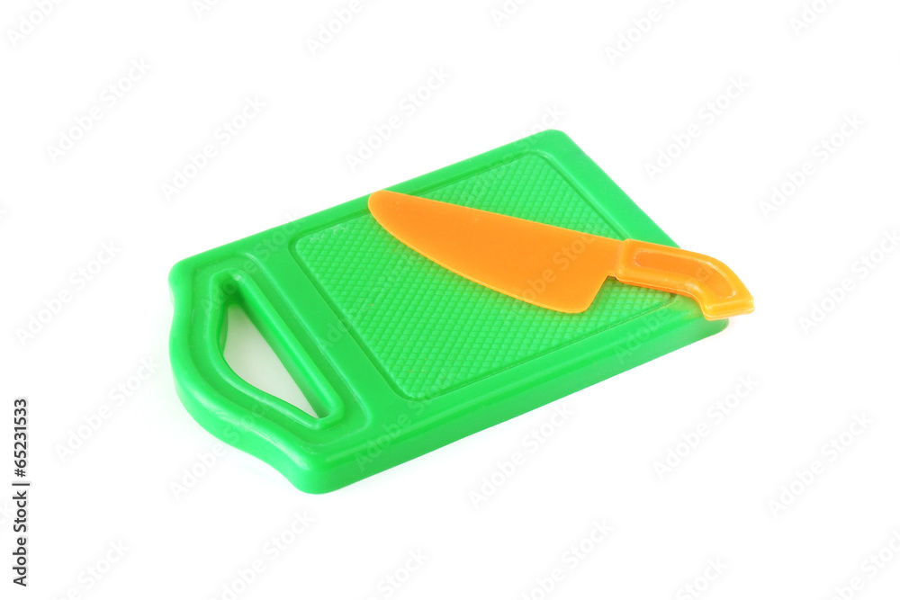 plastic toy green chopping board and orange knife plastic toy green chopping board and orange knife