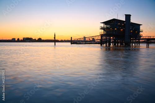Greenwich Yacht club at high tide, London. © milangonda