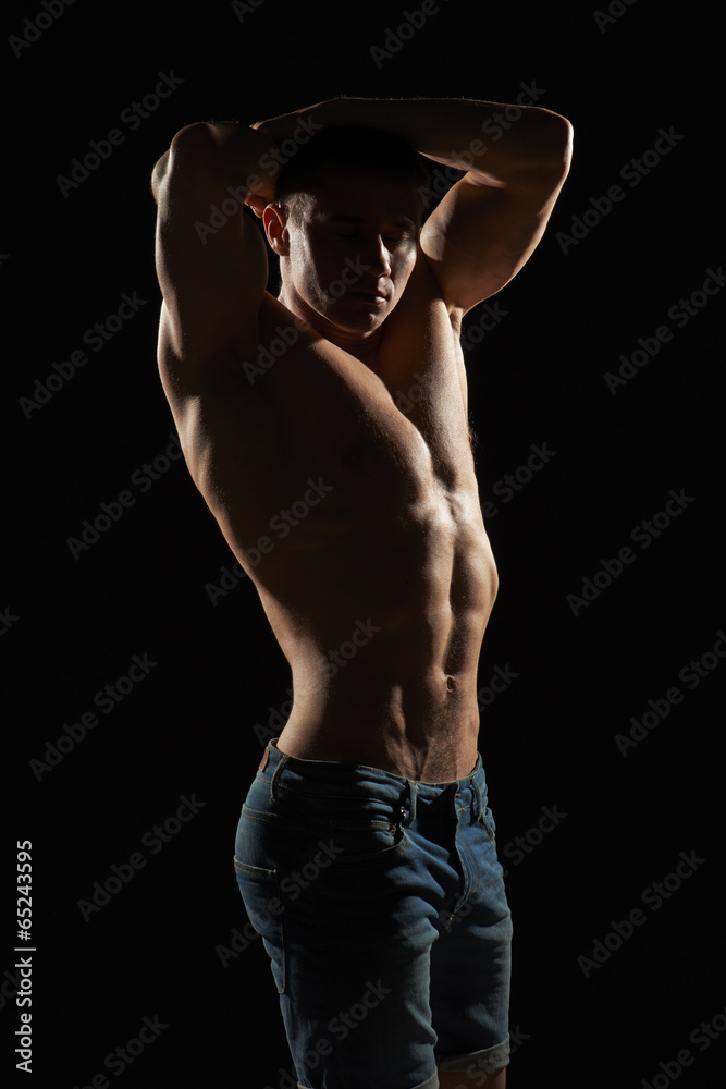 Muscle man posing in studio Muscle man posing in studio