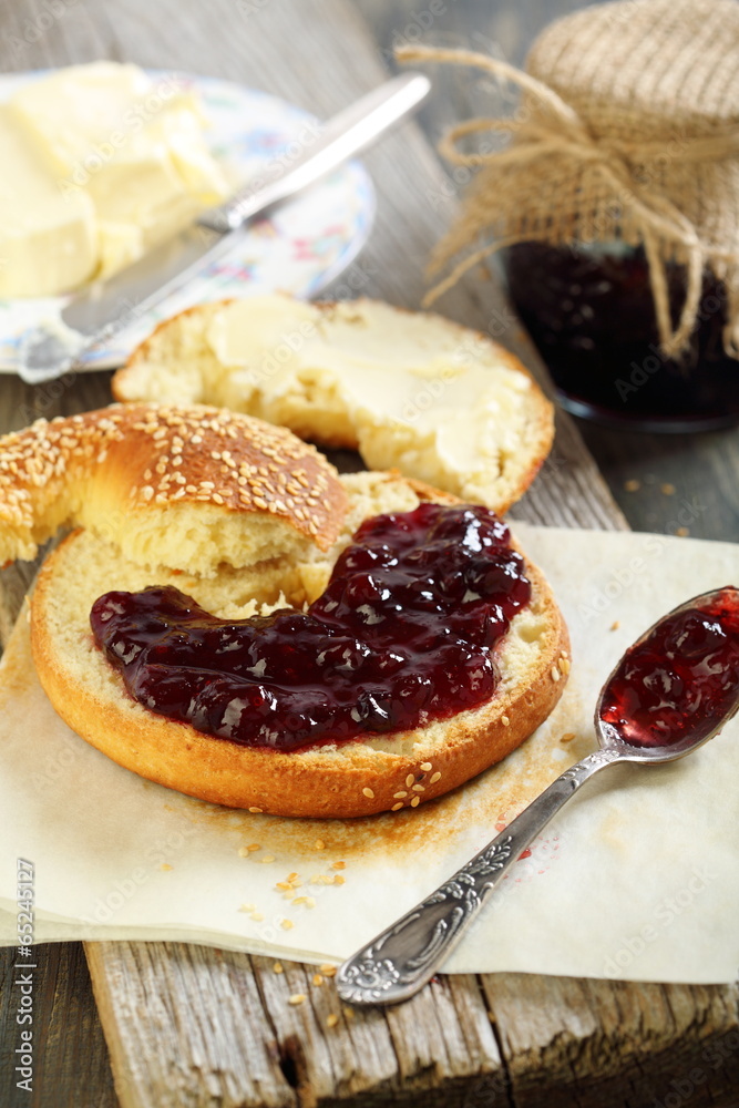 Bagel with jam and butter. Bagel with jam and butter.