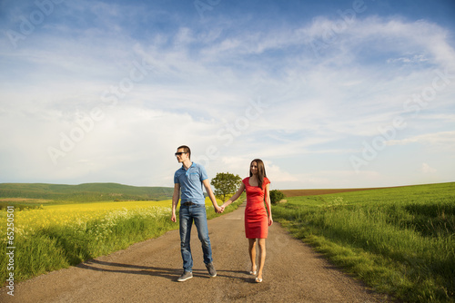 Couple in love on countryside road