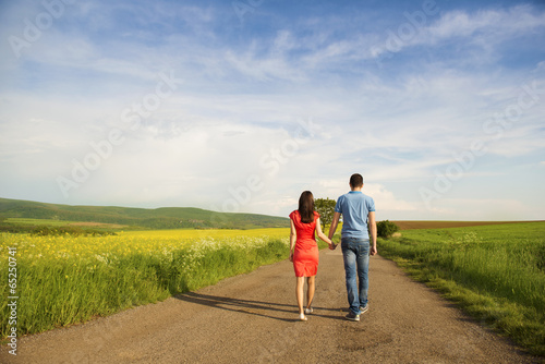 Couple in love on countryside road