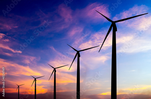 wind turbine silhouette on colorful sunset