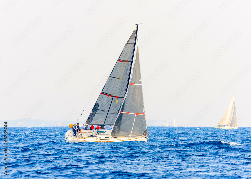 Fototapeta premium Sailing boat during a regatta out of Poros island in Greece