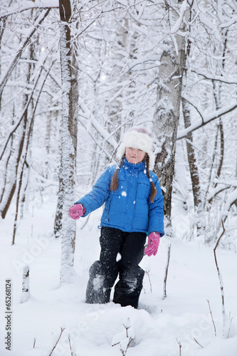 wonderful child in the snowy woods