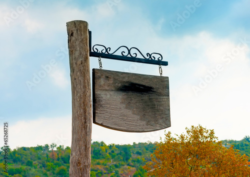 wooden made traditional label at Portaria village in Greece photo