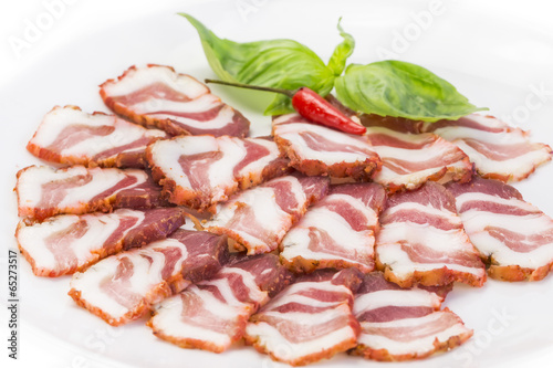 bacon, onion and pepper on a plate in a restaurant