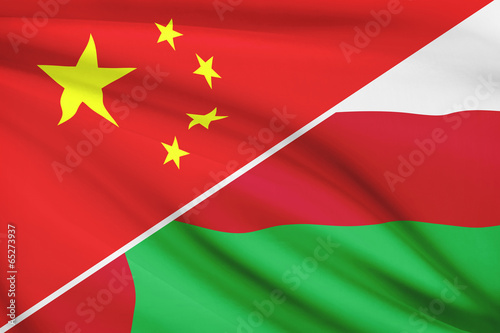 Series of ruffled flags. China and Sultanate of Oman.