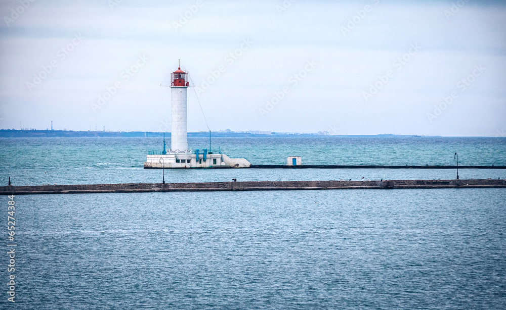 Vorontsovsky lighthouse near a pier in Odessa port, Ukraine