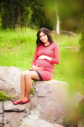 Beautiful pregnant woman outdoor