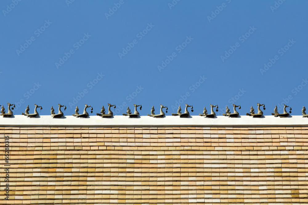 Naklejka premium Sculpture on the roof of buddhist temple ,Chiangmai Thailand