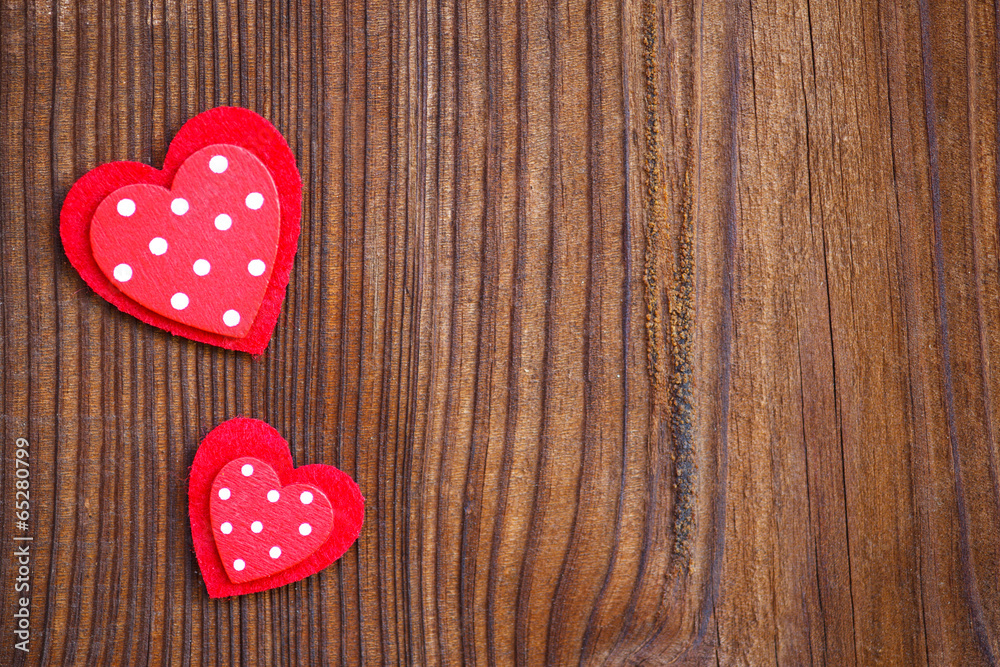 Fototapeta premium red hearts on wooden board