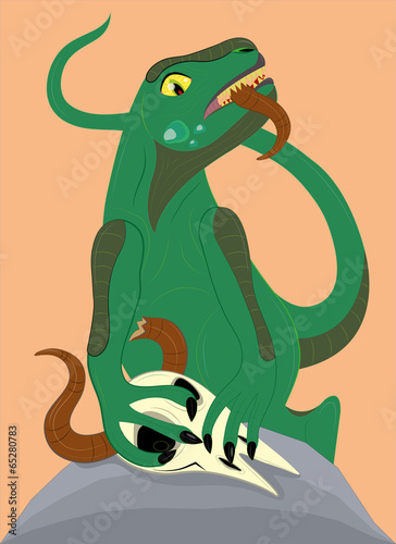 The dinosaur eats a skull.