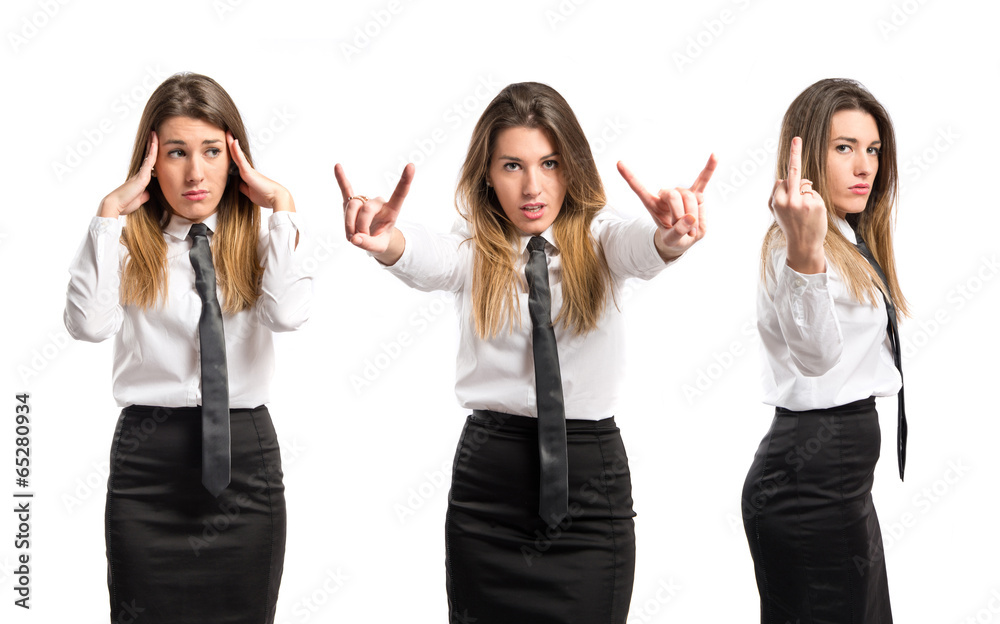 young businesswoman making horn gesture over white background young businesswoman making horn gesture over white background