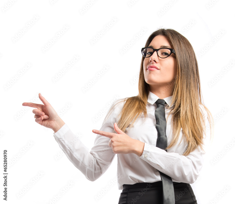 Young pretty businesswoman pointing over white background Young pretty businesswoman pointing over white background