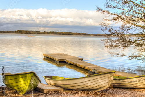 Canvas Print Rowboats by the lake