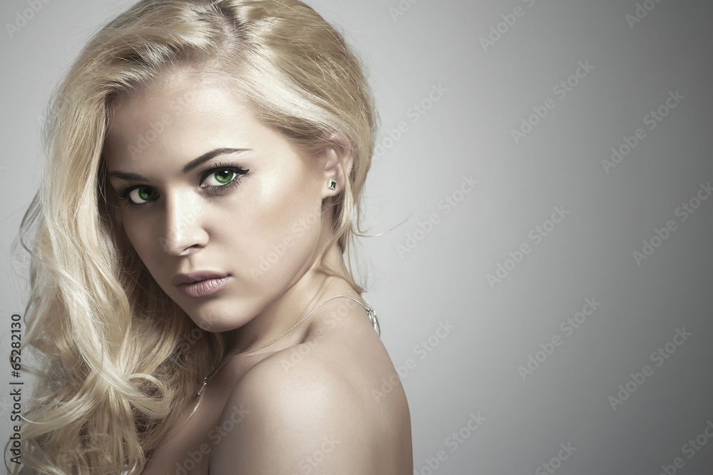 Fashion portrait of young beautiful woman.Sexy Blond girl Fashion portrait of young beautiful woman.Sexy Blond girl