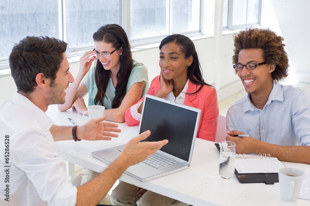 Casual business team having a meeting Casual business team having a meeting