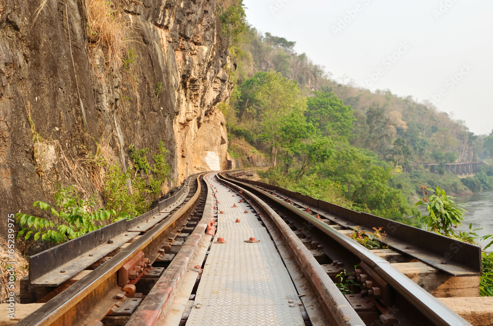 Fototapeta premium Dead railway beside cliff, along Kwai river in Thailand