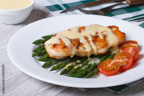 grilled chicken fillet with asparagus and sauce