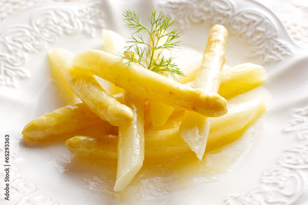 White asparagus steamed with butter and fresh dill White asparagus steamed with butter and fresh dill