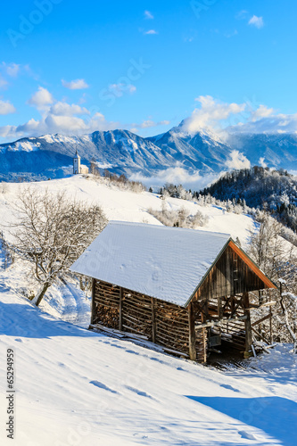 St. Primož church near Jamnik in winter, Slovenia © erikzunec