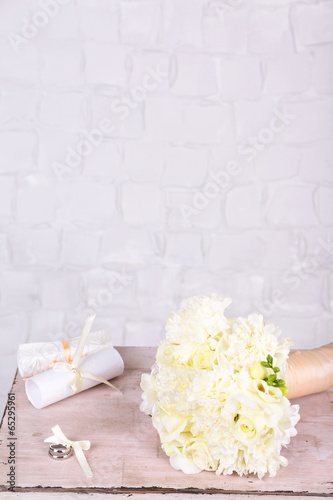 Beautiful wedding bouquet on grey wall background