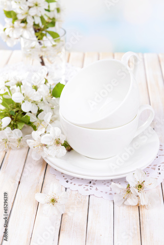 Beautiful fruit blossom on table on light background