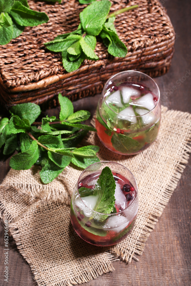 Tasty cocktail with fresh grapefruit and mint leaves