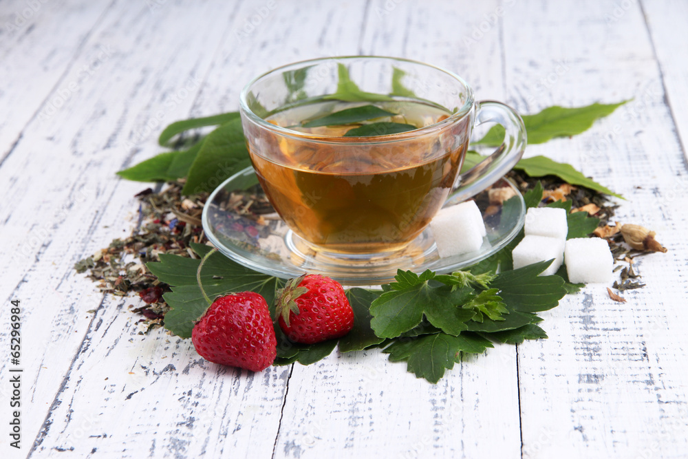 Composition with dry flowers  fresh leaves and fruits