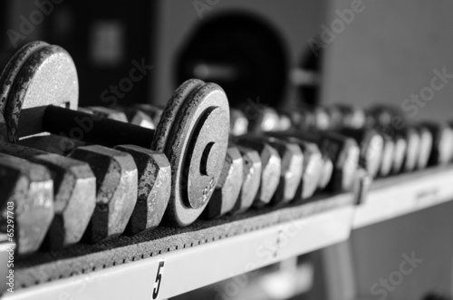 Foto Dumbbells on a rack