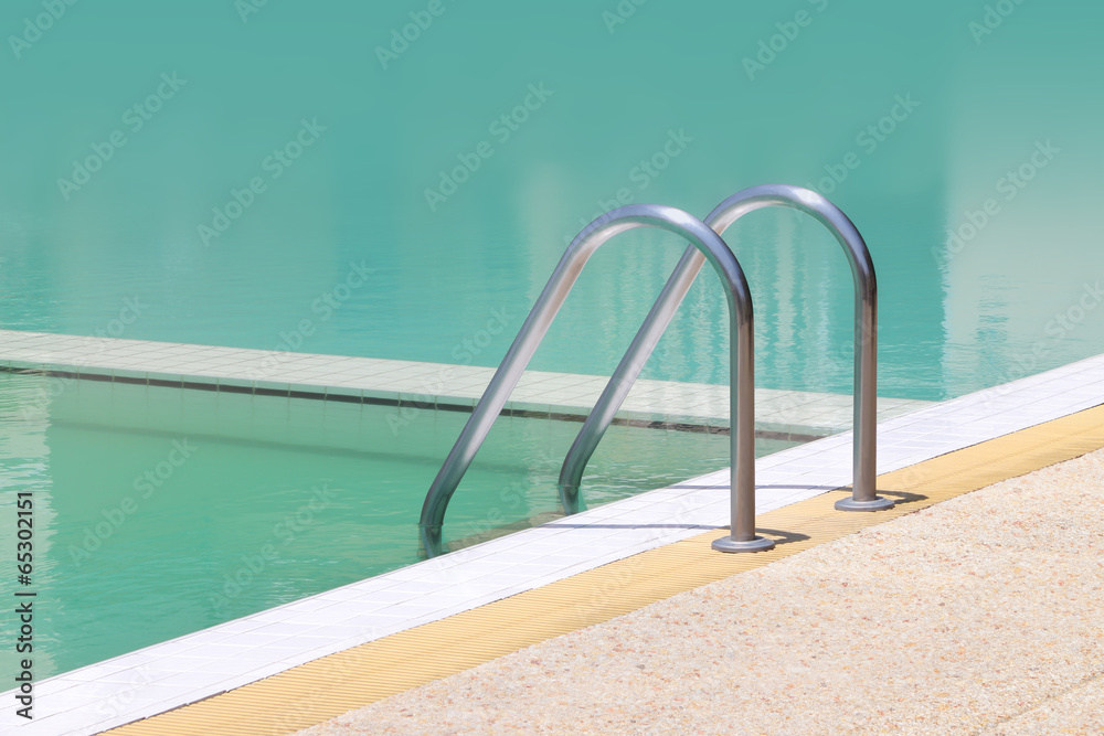 Left side stair bar arm of swimming pool.