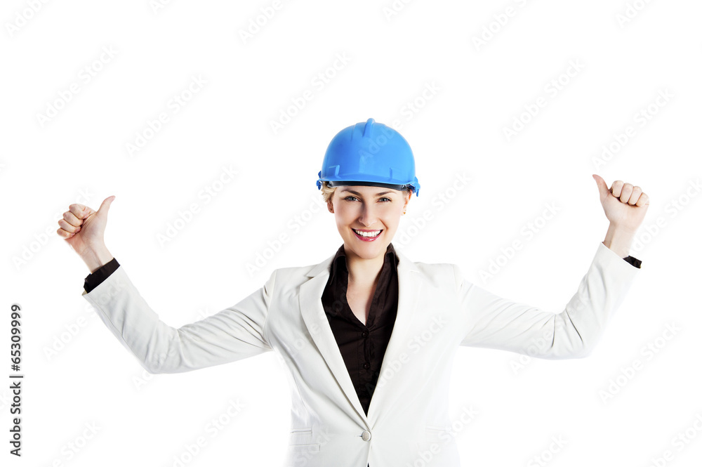 Portrait of confident young female architect standing arms up th Portrait of confident young female architect standing arms up th