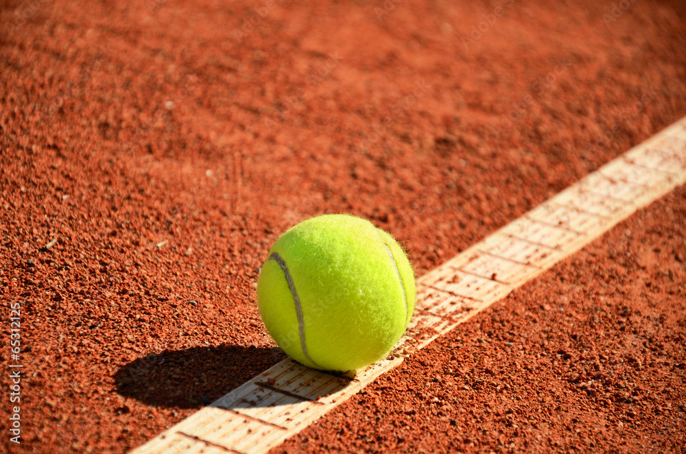tennis ball is on the markup diagonal horizontal