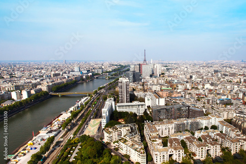 panoramic view over Paris with Eiffel tower and Seine river, France