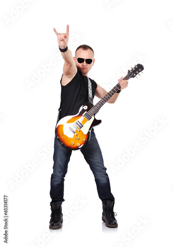musician playing on electrical guitar photo
