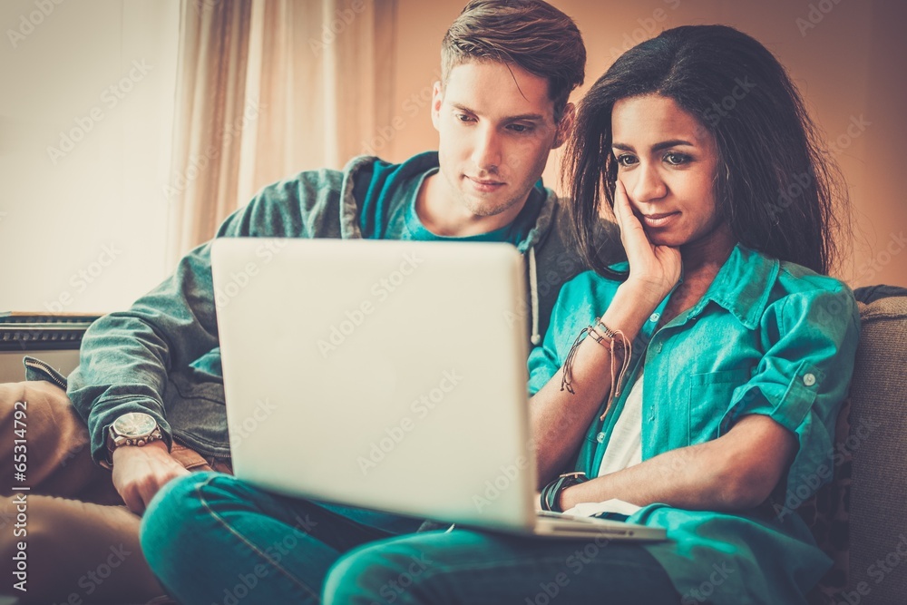 Young multi ethnic students couple preparing for exams Young multi ethnic students couple preparing for exams