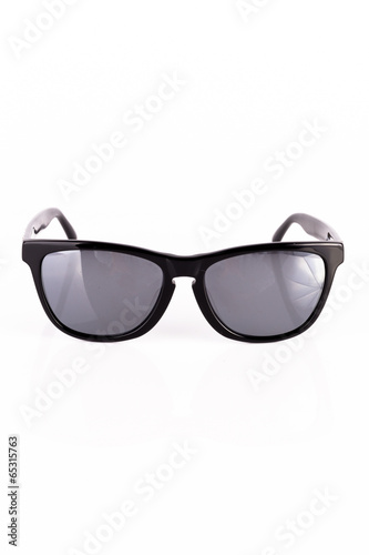 oldstyle black sunglasses isolated on white