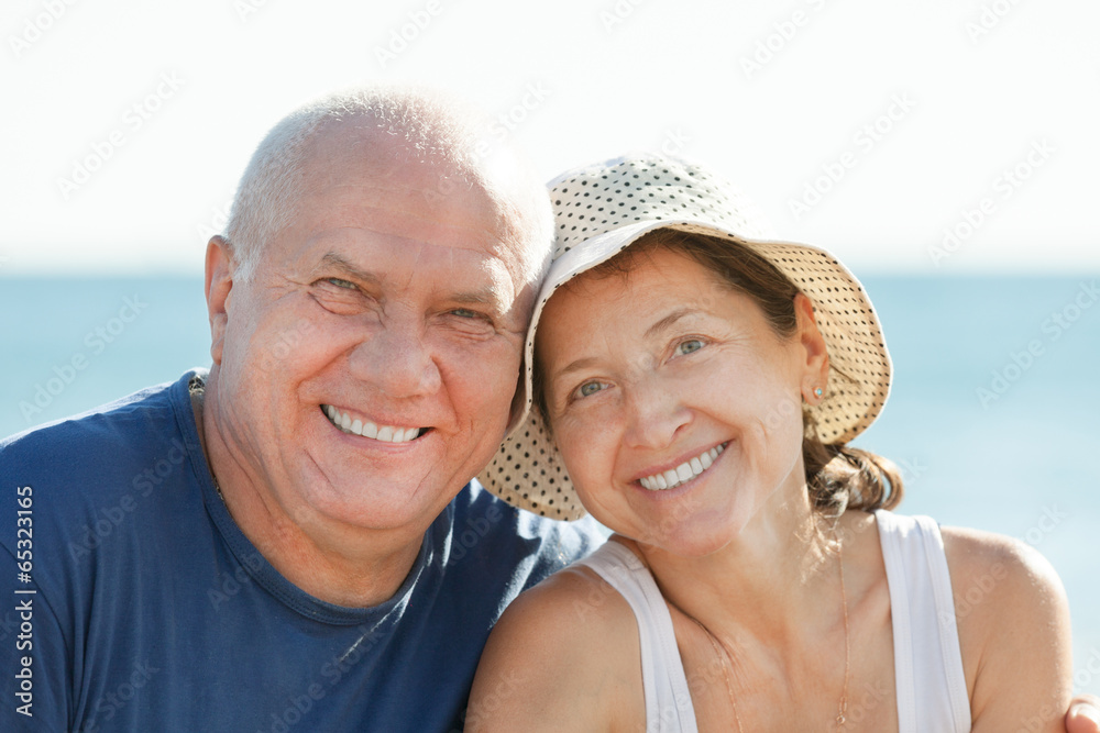 Fototapeta premium Mature couple at sea beach