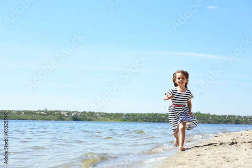 Beautiful little girl on th...