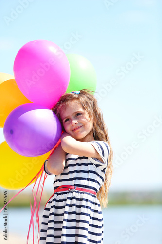 Beautiful little girl with ...