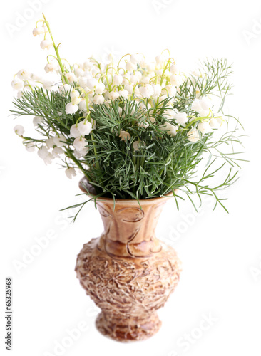 Beautiful lilies of the valley in vase, isolated on white
