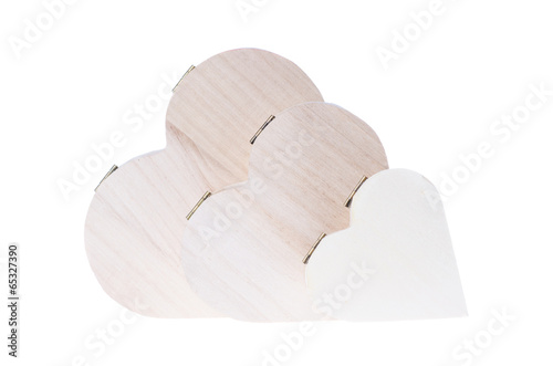Three heart shaped wooden gift boxes isolated on white