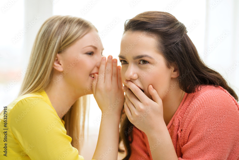 one girl telling another secret one girl telling another secret