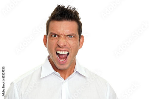 Angry handsome man in white shirt roars
