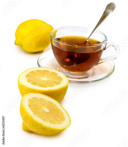 isolated image of a cup of tea and lemons